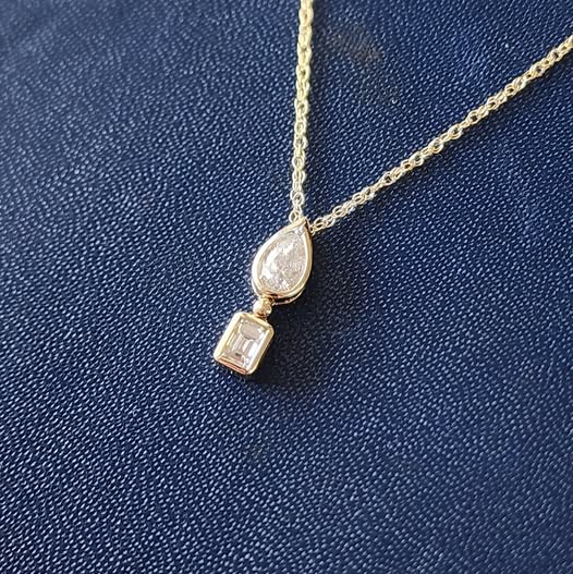 Pear and Emerald Cut Diamond Pendant